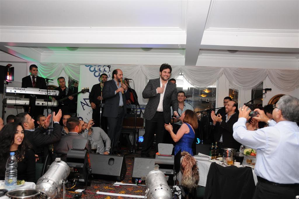 Melhem Zein performing with the AMW band